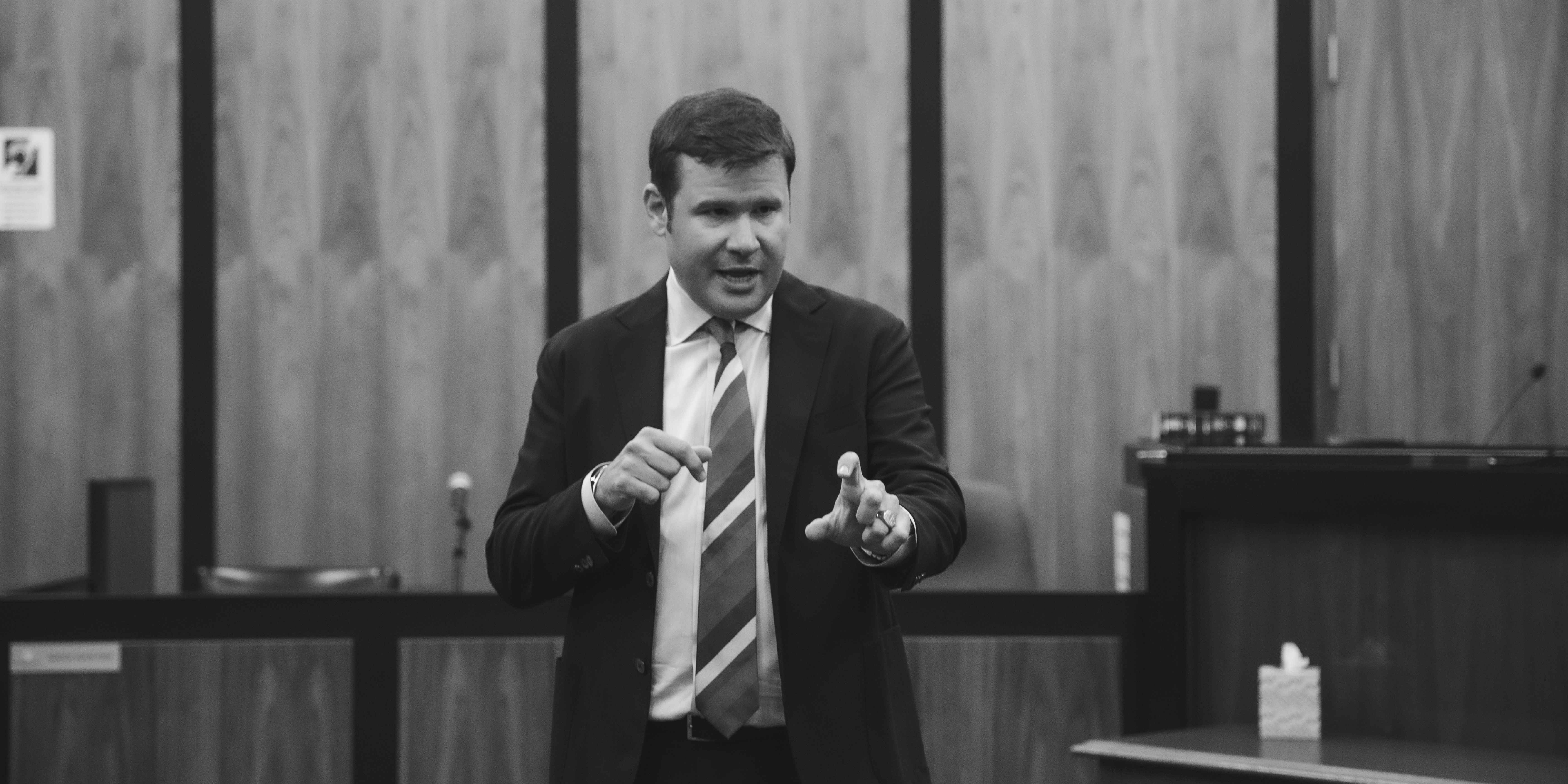 Jones bw in court explaining with hands banner Oct 2025